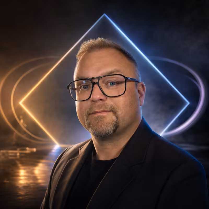Christoph Mayer, founder of FrameShift, in front of a glowing neon frame.